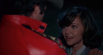 Movie still from “Smokey and the Bandit II” (1980), directed by Hal Needham – A man and a woman are talking to each other; Close Up shot, Over the shoulder angle