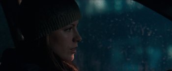Movie still from “Snow Angels” (2007), directed by David Gordon Green – A person wearing a hat; Close Up shot, Over the shoulder angle