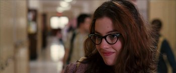 Movie still from “Snow Angels” (2007), directed by David Gordon Green – A person wearing glasses; Close Up shot, Over the shoulder angle