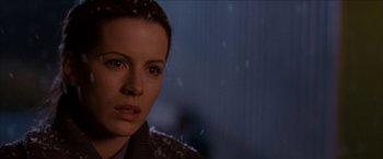 Movie still from “Snow Angels” (2007), directed by David Gordon Green – A person wearing a jacket; Close Up shot, Over the shoulder angle