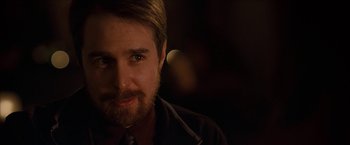 Movie still from “Snow Angels” (2007), directed by David Gordon Green – A person wearing a tie; Close Up shot, Over the shoulder angle