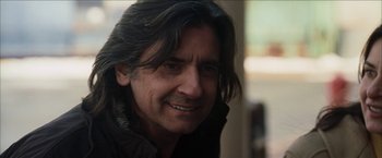 Movie still from “Snow Angels” (2007), directed by David Gordon Green – A person with long hair; Close Up shot, Over the shoulder angle