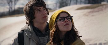 Movie still from “Snow Angels” (2007), directed by David Gordon Green – A man and a woman looking up at the sky; Close Up shot, Low angle