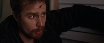 Movie still from “Snow Angels” (2007), directed by David Gordon Green – A person with a head wound; Close Up shot, Low angle