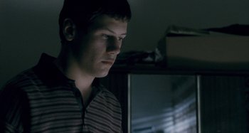 Movie still from “The Snowtown Murders” (2011), directed by Justin Kurzel – A young man is looking into the distance; Close Up shot, Low angle