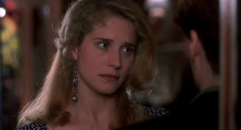 Movie still from “So I Married an Axe Murderer” (1993), directed by Thomas Schlamme – A person with long hair; Close Up shot, Over the shoulder angle