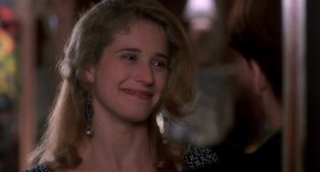 Movie still from “So I Married an Axe Murderer” (1993), directed by Thomas Schlamme – A person with long blonde hair; Close Up shot, Over the shoulder angle