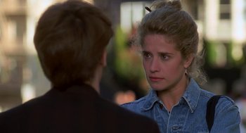 Movie still from “So I Married an Axe Murderer” (1993), directed by Thomas Schlamme – A woman in a jean jacket talking to a man; Close Up shot, Over the shoulder angle