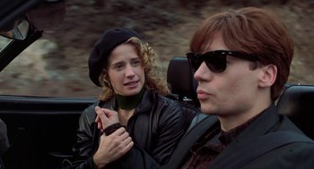 Movie still from “So I Married an Axe Murderer” (1993), directed by Thomas Schlamme – A woman in a black jacket and a man in a black jacket; Close Up shot, Over the shoulder angle