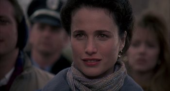 Movie still from “Groundhog Day” (1993), directed by Harold Ramis – A person wearing a scarf; Close Up shot, Over the shoulder angle