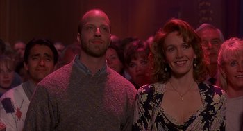 Movie still from “Groundhog Day” (1993), directed by Harold Ramis – A man and a woman standing next to each other; Close Up shot, Low angle