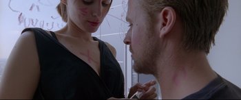 Movie still from “Song to Song” (2017), directed by Terrence Malick – A man and a woman looking at each other; Close Up shot, Over the shoulder angle