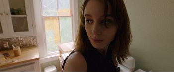 Movie still from “Song to Song” (2017), directed by Terrence Malick – A person with long hair; Close Up shot, Low angle