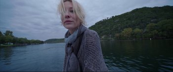 Movie still from “Song to Song” (2017), directed by Terrence Malick – A woman with blonde hair wearing a gray sweater; Close Up shot, Low angle