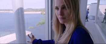 Movie still from “Song to Song” (2017), directed by Terrence Malick – A blonde woman is looking out of a window; Close Up shot, Low angle
