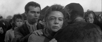 Movie still from “Sons and Lovers” (1960), directed by Jack Cardiff – An old black and white photo of a woman crying; Close Up shot, Low angle
