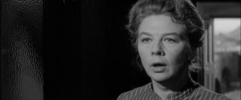 Movie still from “Sons and Lovers” (1960), directed by Jack Cardiff – An old photo of an older woman in a striped shirt; Close Up shot, Low angle