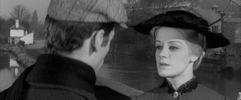 Movie still from “Sons and Lovers” (1960), directed by Jack Cardiff – A man and a woman are looking at each other; Close Up shot, Over the shoulder angle