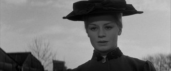 Movie still from “Sons and Lovers” (1960), directed by Jack Cardiff – A black and white photo of a woman wearing a hat; Close Up shot, Low angle