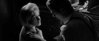Movie still from “Sons and Lovers” (1960), directed by Jack Cardiff – A man and a woman looking at one another; Close Up shot, Over the shoulder angle