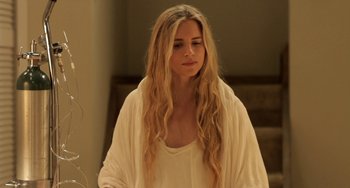 Movie still from “Sound of My Voice” (2011), directed by Zal Batmanglij – A beautiful young woman with long blonde hair; Close Up shot, Low angle