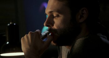 Movie still from “Sound of My Voice” (2011), directed by Zal Batmanglij – A person brushing his teeth; Extreme Close Up shot, Low angle