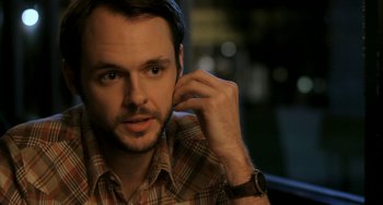 Movie still from “Sound of My Voice” (2011), directed by Zal Batmanglij – A person wearing a watch; Close Up shot, Over the shoulder angle