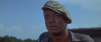 Movie still from “Sounder” (1972), directed by Martin Ritt – A person wearing a hat; Close Up shot, Low angle