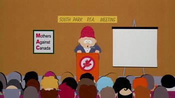Movie still from “South Park: Bigger, Longer & Uncut” (1999), directed by Trey Parker – A group of people sitting in front of an audience; Medium shot, High angle