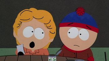 Movie still from “South Park: Bigger, Longer & Uncut” (1999), directed by Trey Parker – A couple of people that are sitting at a table; Close Up shot, High angle