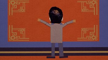 Movie still from “South Park: Bigger, Longer & Uncut” (1999), directed by Trey Parker – A paper cut out of a man standing in front of a wall; Medium shot, Low angle