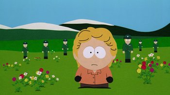 Movie still from “South Park: Bigger, Longer & Uncut” (1999), directed by Trey Parker – A cartoon of a person in a field with other people; Medium shot, High angle