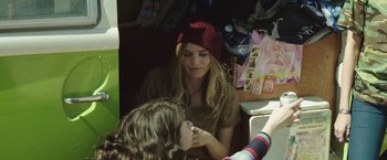 Movie still from “Southbound” (2015), directed by Tyler Gillett – A woman sitting in front of a young girl; Close Up shot, Over the shoulder angle