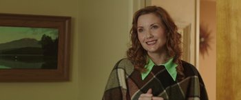 Movie still from “Southbound” (2015), directed by Tyler Gillett – A person wearing a sweater; Close Up shot, Over the shoulder angle