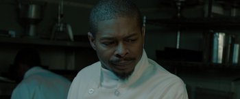 Movie still from “Sparkle” (2012), directed by Salim Akil – A person wearing a white shirt; Close Up shot, Low angle