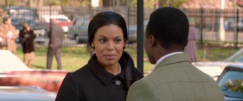 Movie still from “Sparkle” (2012), directed by Salim Akil – A woman and a man are standing in front of each other; Close Up shot, Over the shoulder angle
