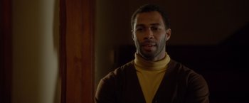 Movie still from “Sparkle” (2012), directed by Salim Akil – A person wearing a sweater; Close Up shot, Over the shoulder angle