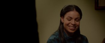 Movie still from “Sparkle” (2012), directed by Salim Akil – A young woman smiling with her eyes closed; Close Up shot, Over the shoulder angle