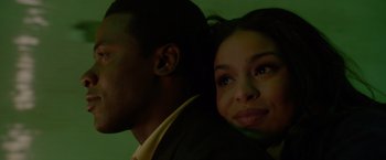 Movie still from “Sparkle” (2012), directed by Salim Akil – A man and a woman posing for a picture; Close Up shot, Low angle