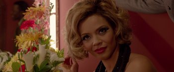 Movie still from “Sparkle” (2012), directed by Salim Akil – A person wearing a black shirt; Close Up shot, Over the shoulder angle