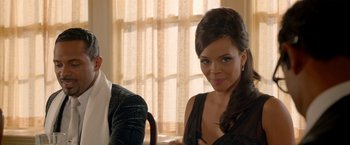 Movie still from “Sparkle” (2012), directed by Salim Akil – A woman sitting next to a man in front of a window; Close Up shot, Over the shoulder angle