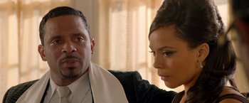 Movie still from “Sparkle” (2012), directed by Salim Akil – A man and a woman sitting next to each other in a room; Close Up shot, Over the shoulder angle