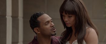 Movie still from “Sparkle” (2012), directed by Salim Akil – A man and a woman looking at one another; Close Up shot, Over the shoulder angle