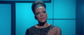 Movie still from “Sparkle” (2012), directed by Salim Akil – A person wearing a dress; Close Up shot, Low angle