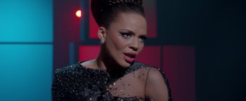 Movie still from “Sparkle” (2012), directed by Salim Akil – A person wearing a dress; Close Up shot, Over the shoulder angle
