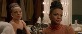 Movie still from “Sparkle” (2012), directed by Salim Akil – A person sitting in front of a mirror; Close Up shot, Over the shoulder angle