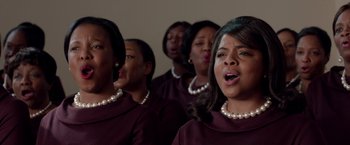 Movie still from “Sparkle” (2012), directed by Salim Akil – A group of women singing in a choir; Close Up shot, Low angle