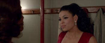 Movie still from “Sparkle” (2012), directed by Salim Akil – A woman in a red dress looking at the camera; Close Up shot, Over the shoulder angle