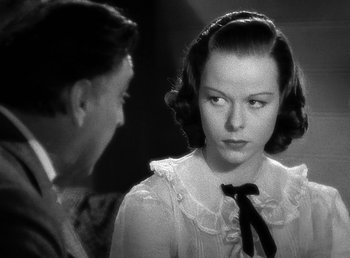 Movie still from “Spawn of the North” (1938), directed by Henry Hathaway – A man and a woman are looking at each other; Close Up shot, Over the shoulder angle