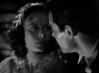 Movie still from “Spawn of the North” (1938), directed by Henry Hathaway – A man and a woman looking into each others eyes; Close Up shot, Over the shoulder angle